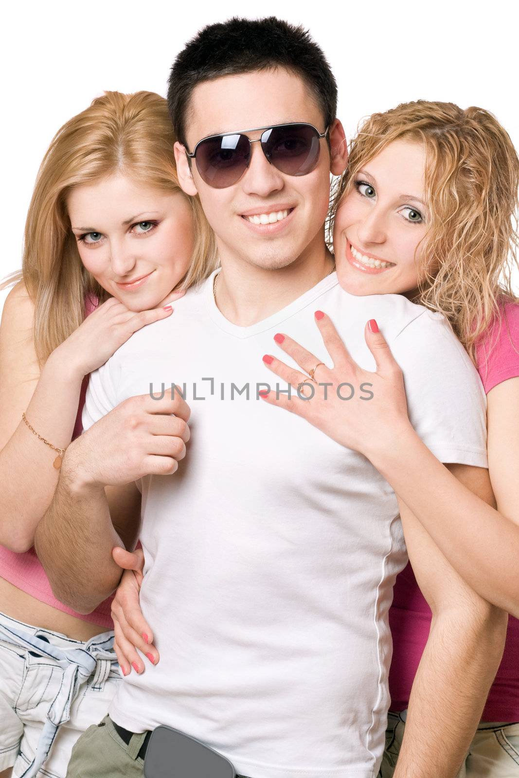 Portrait of a two cheerful blonde women with handsome young man