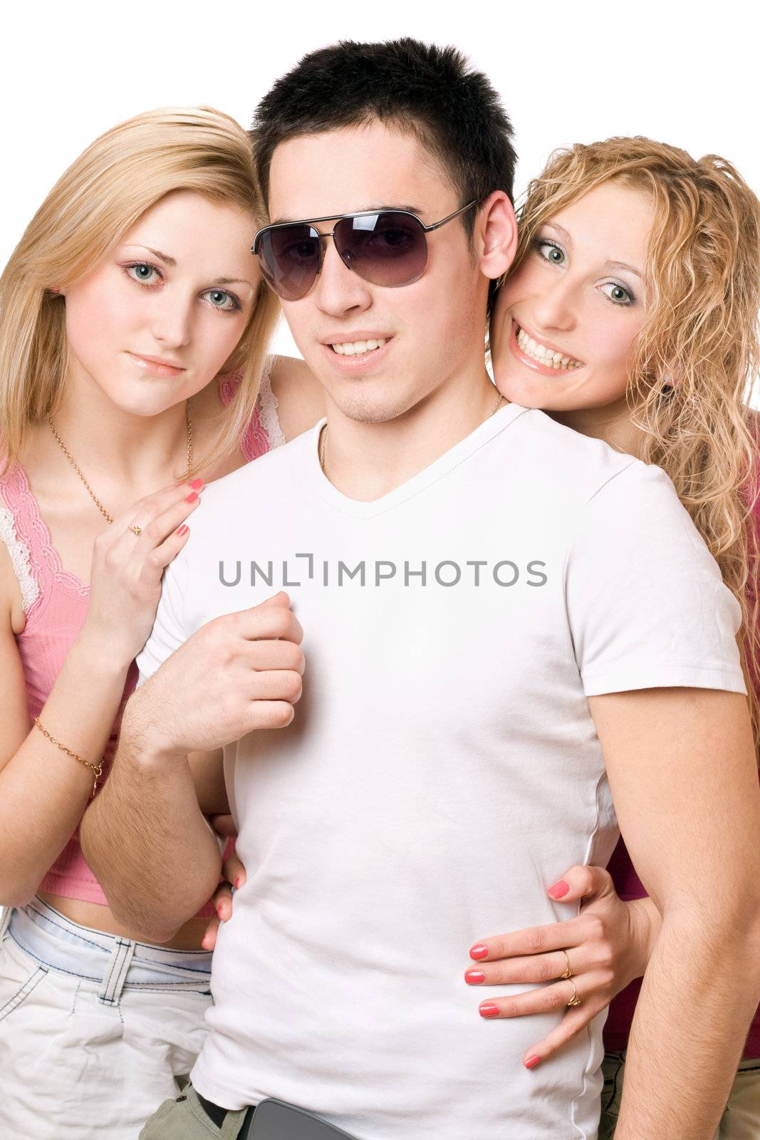 Portrait of a two smiling blonde women with handsome young man