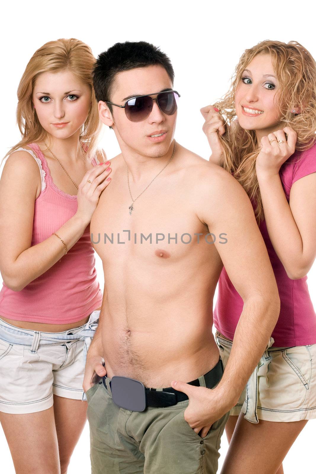 Two smiling beautiful blond women with handsome young man