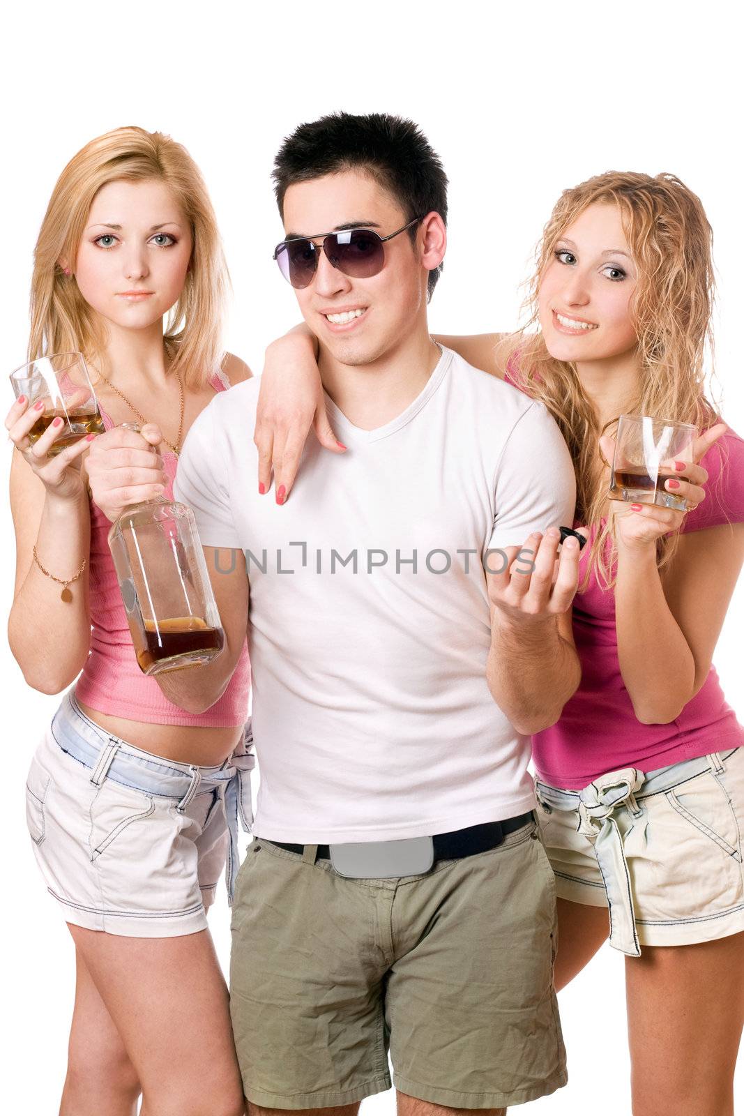 Two attractive blonde woman and young man with a bottle