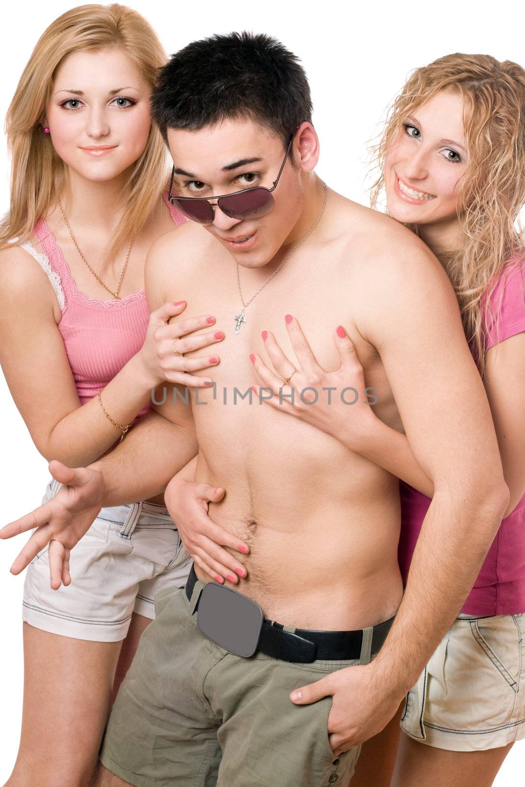 Two smiling pretty blonde women with handsome young man