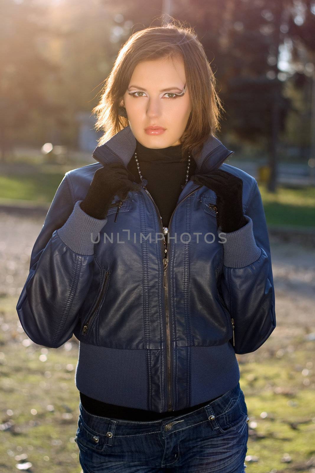 Portrait of a perfect girl in autumn park