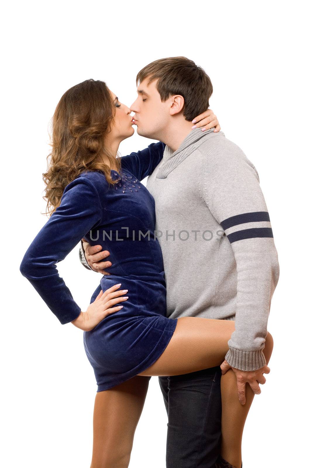 Boy kissing his lovely girl in a sexy pose