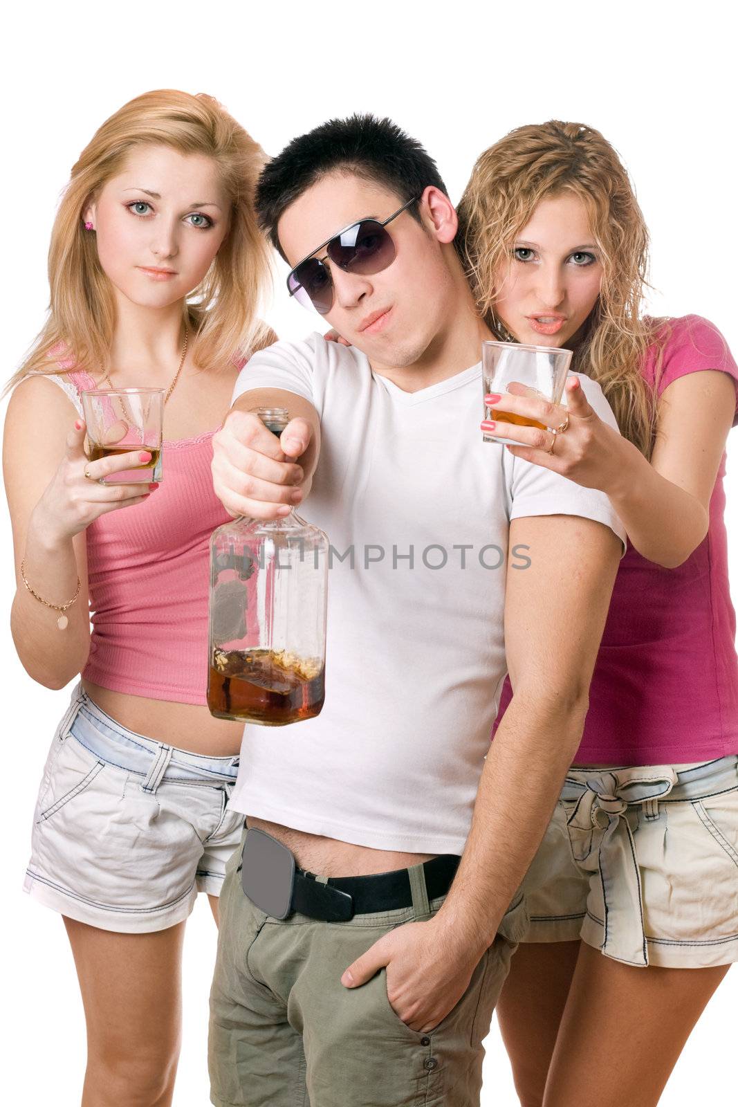 Young people with a bottle of whiskey. Isolated on white