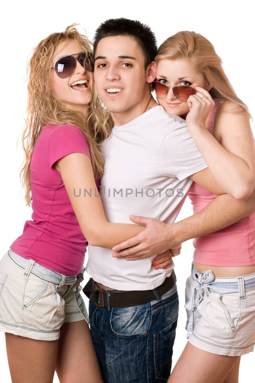 Portrait of a two smiling women and handsome young man