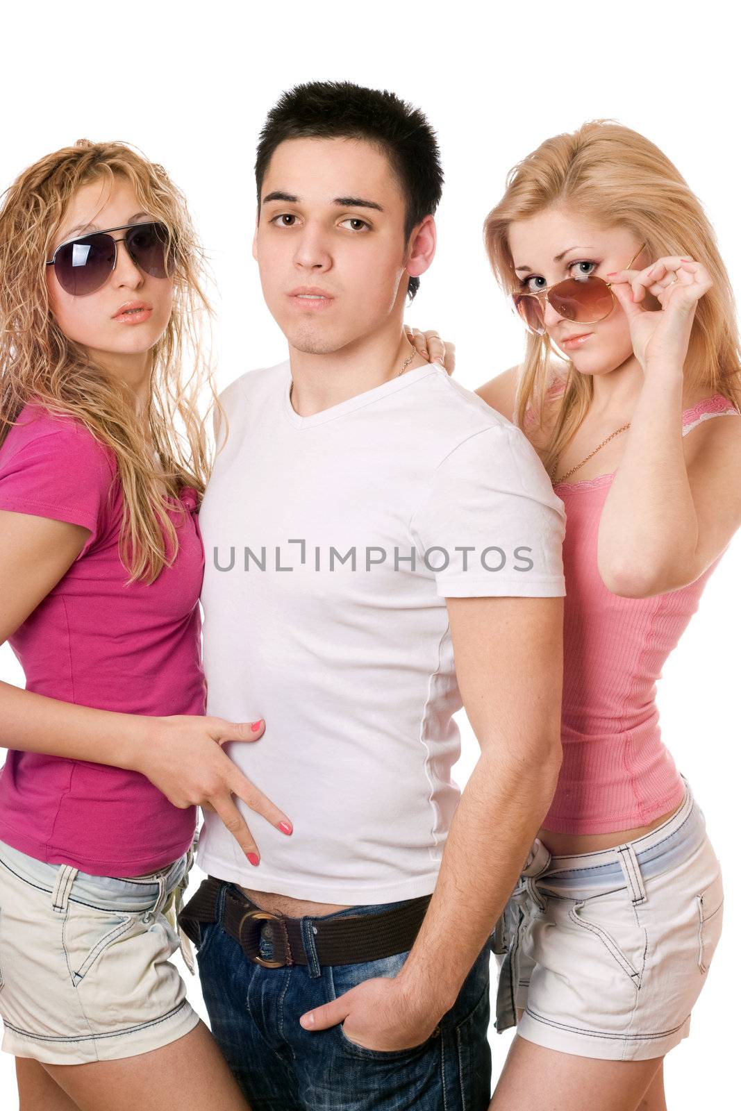 Portrait of a two sensual women and handsome young man. Isolated