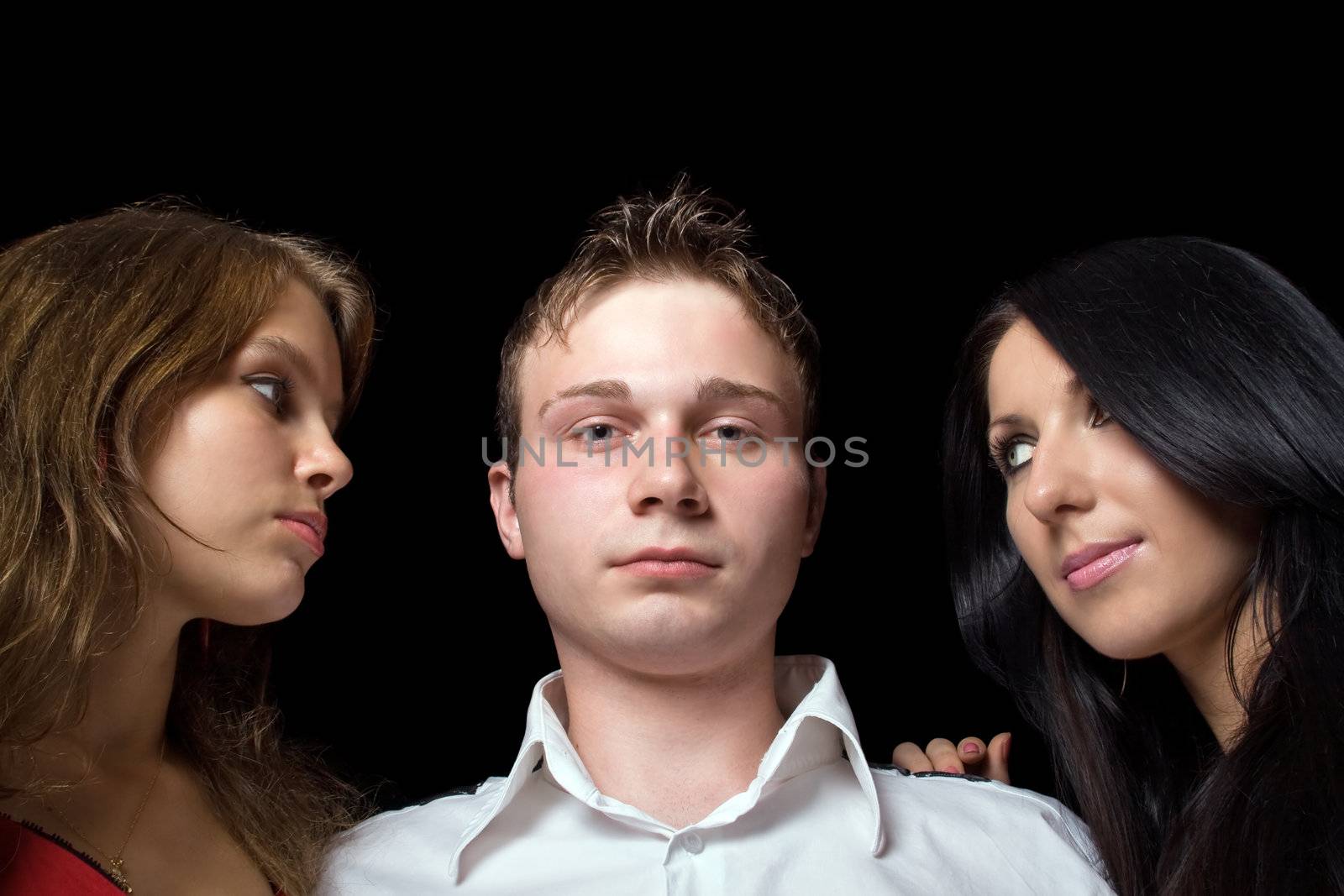 portrait of the young man and two young women. Isolated