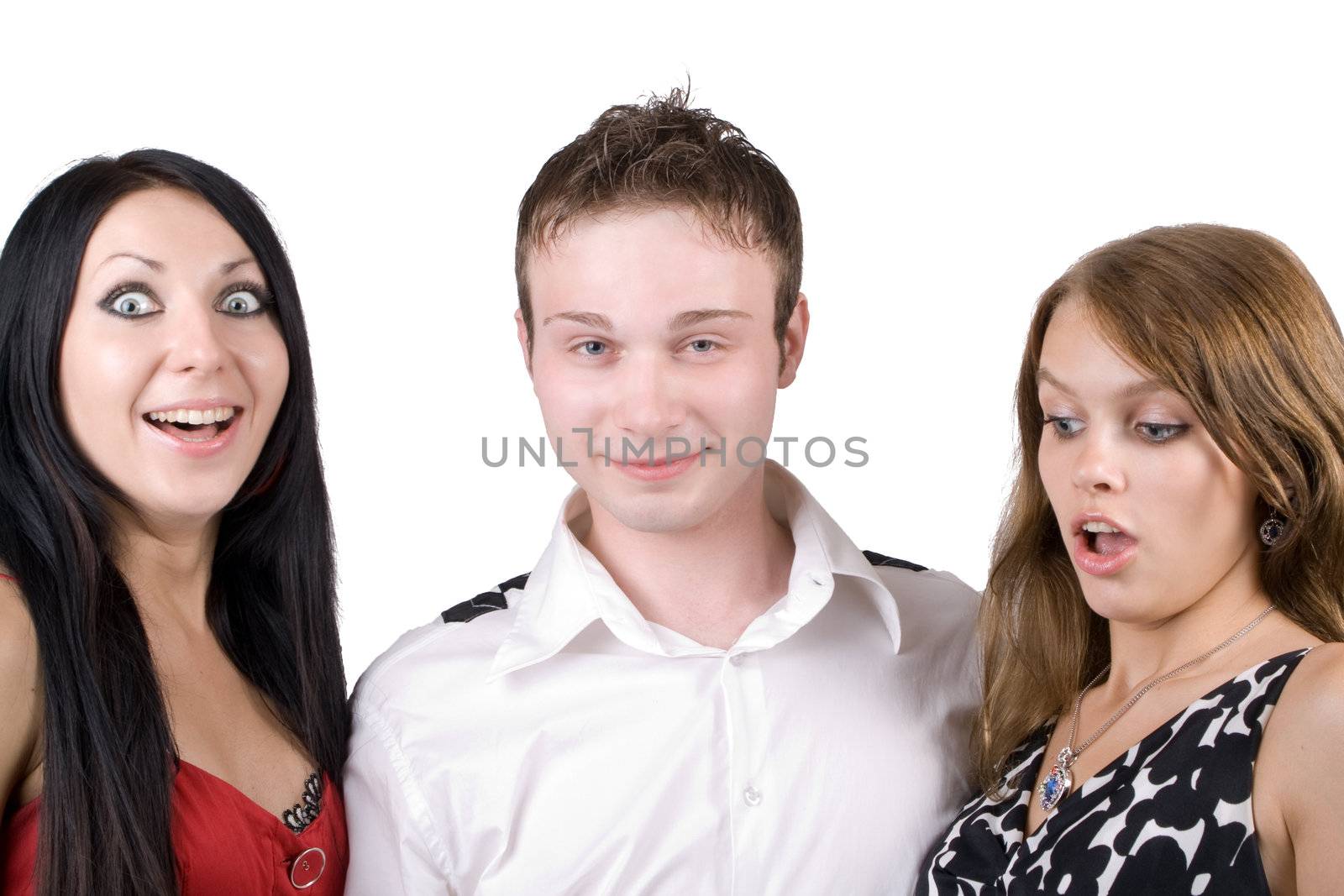 young man and two surprised beauty young women