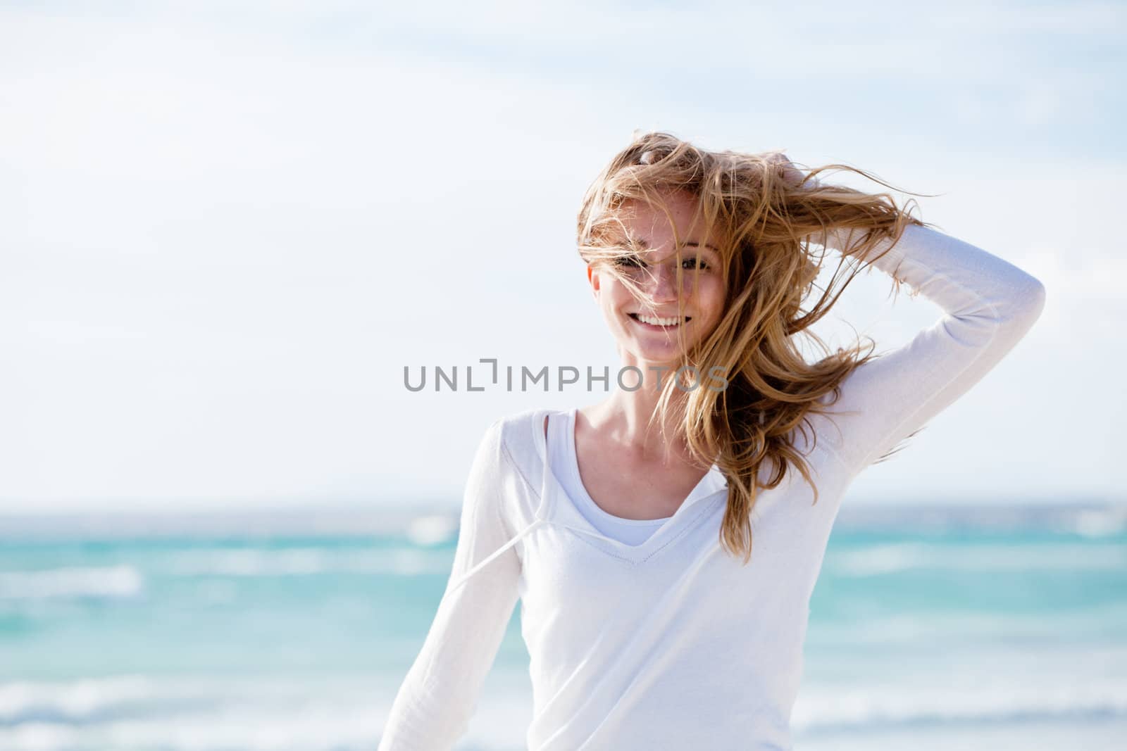 beautiful young woman relaxing at beach in summer  by juniart