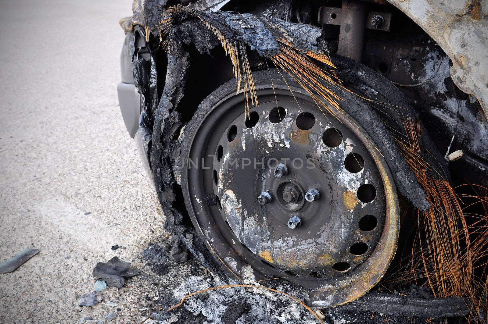 Close up detail of a burnt car in a car accident