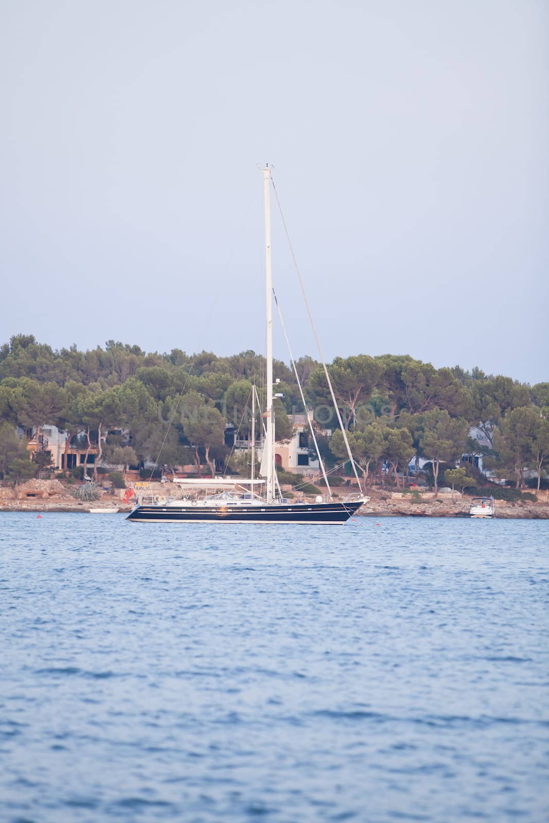 fishing boat in summer outside in sea at harbour background