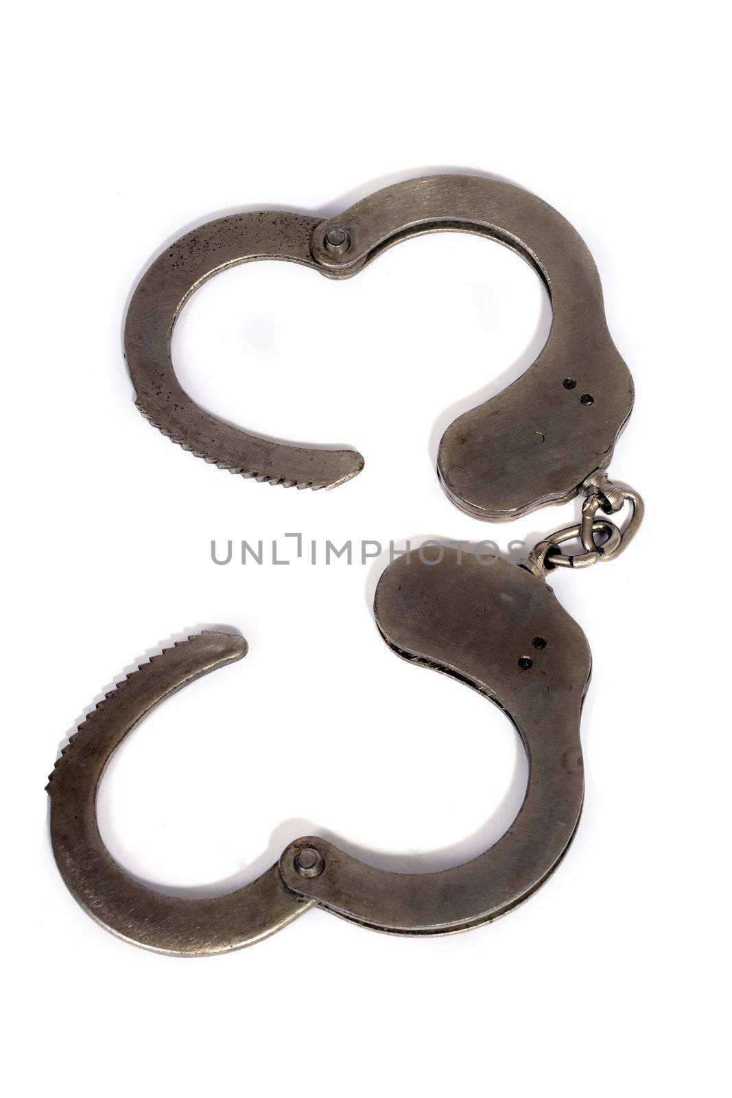 steel handcuffs. isolated on a white background. by acidgrey