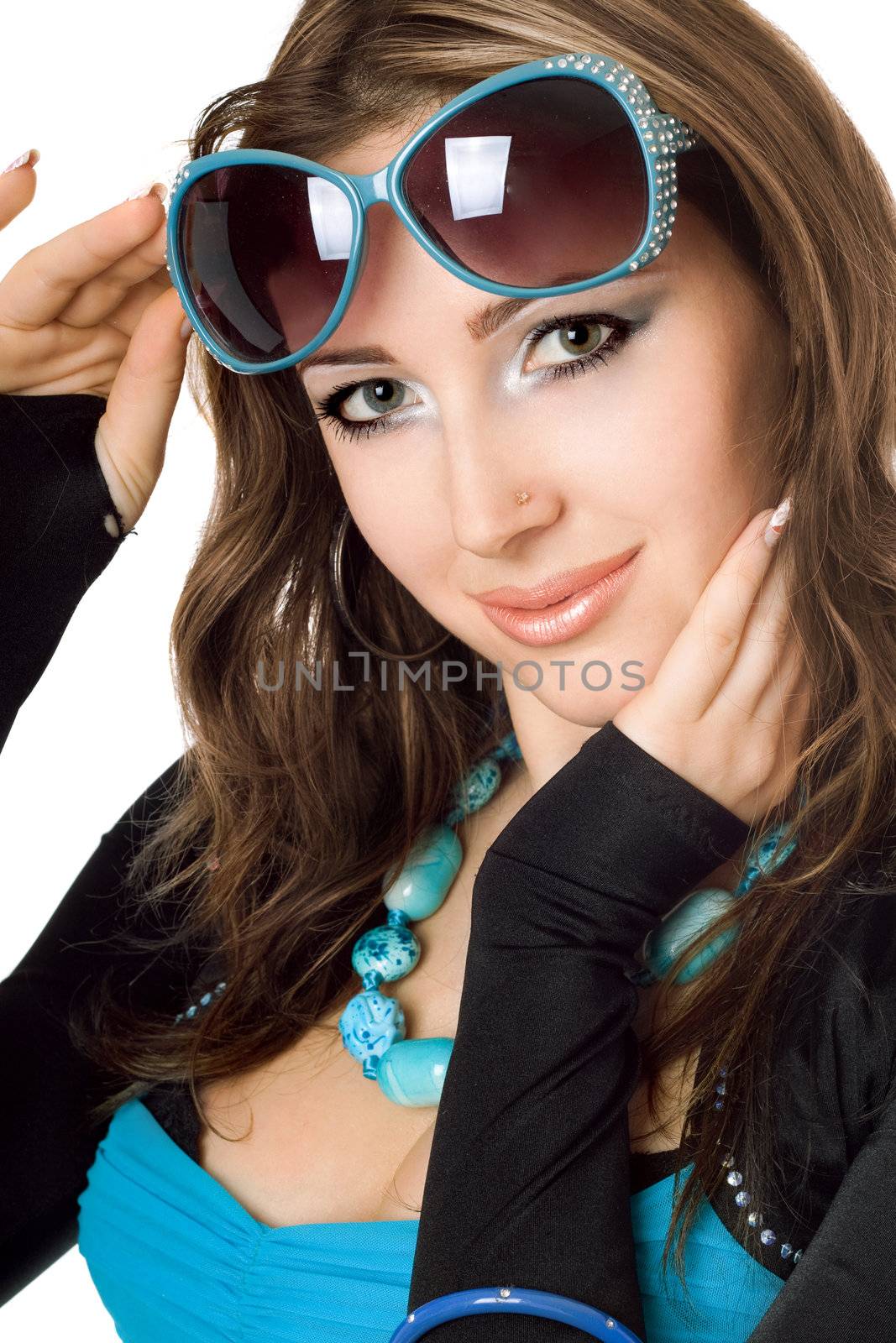 Closeup portrait of attractive young woman in sunglasses. Isolated