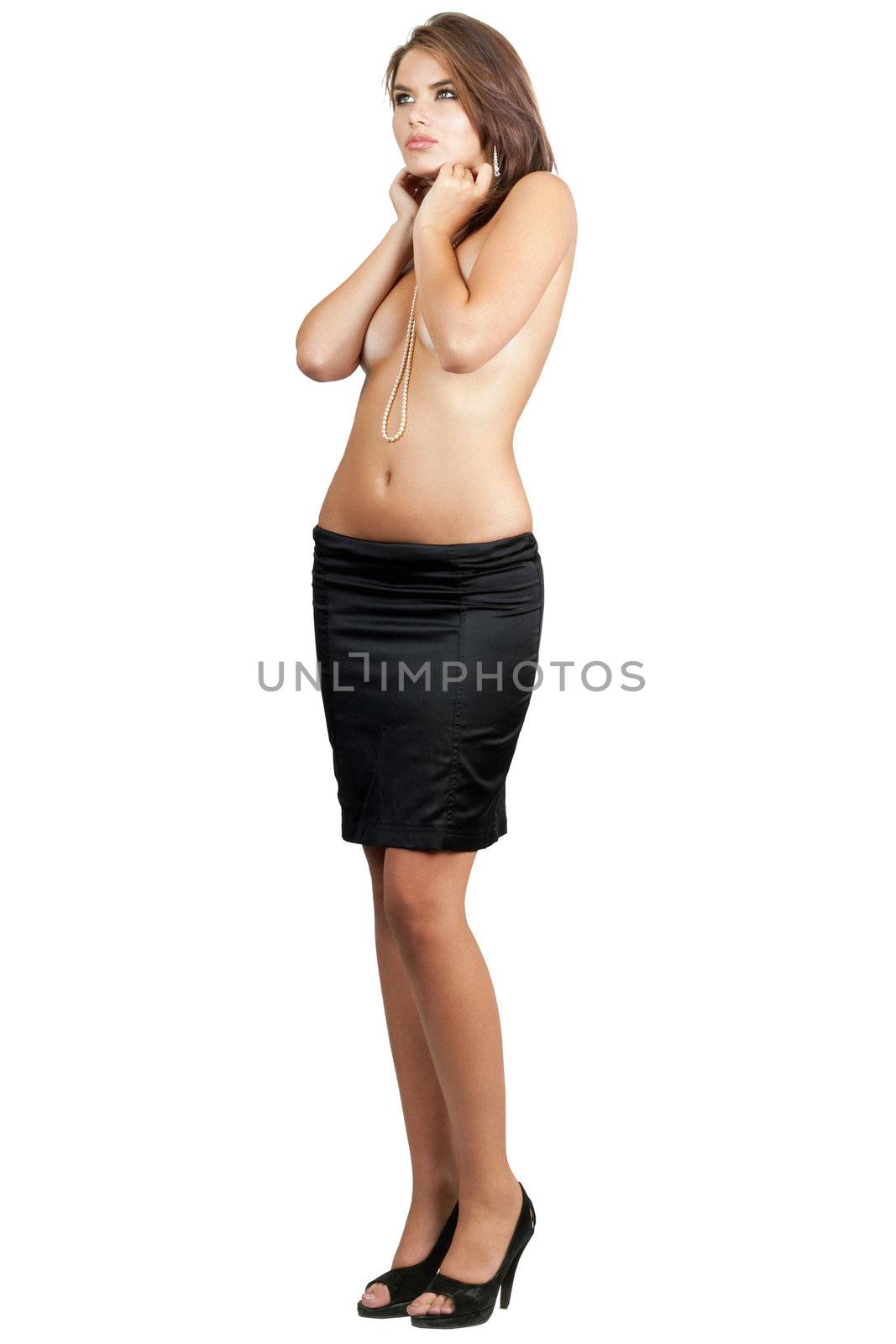 Sexy young woman in black skirt. Isolated on white