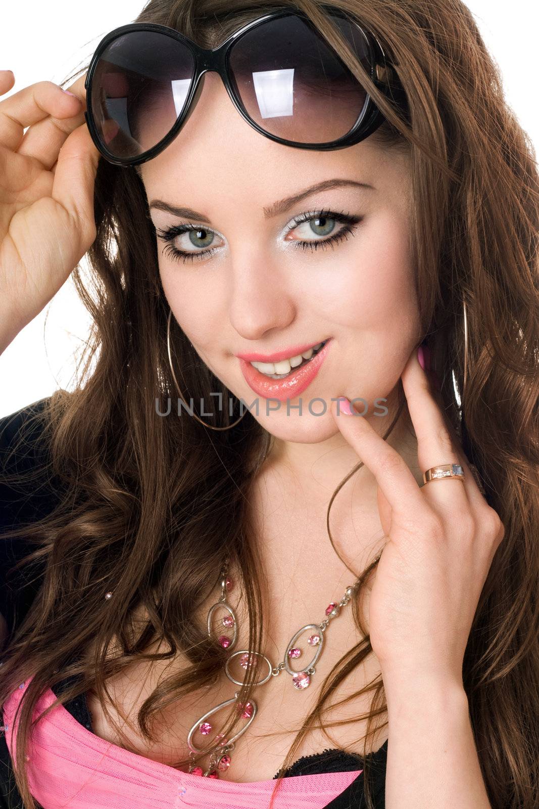 Closeup portrait of smiling young woman. Isolated on white