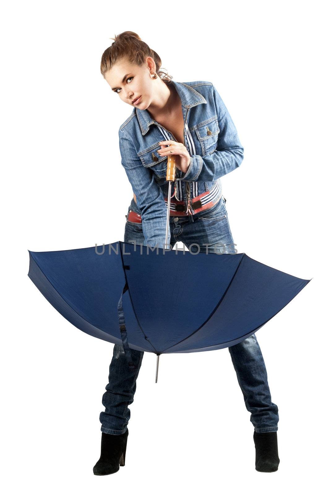 Young woman in a denim suit with umbrella