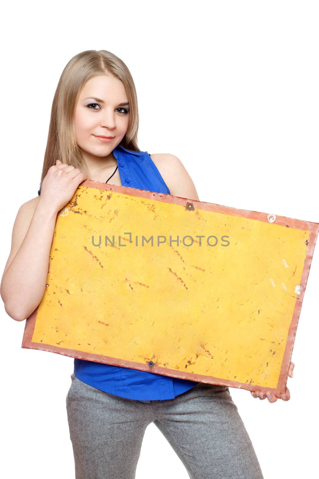 Lovely young woman posing with yellow vintage board. Isolated