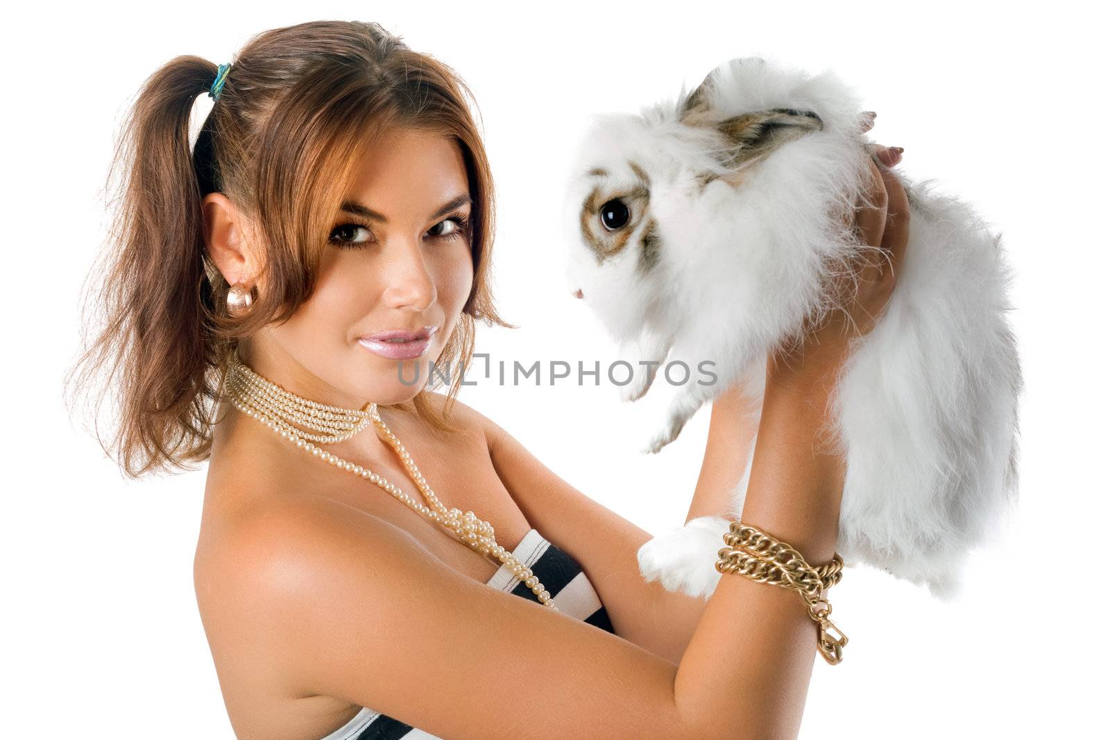 Smiling young woman with little rabbit. Isolated