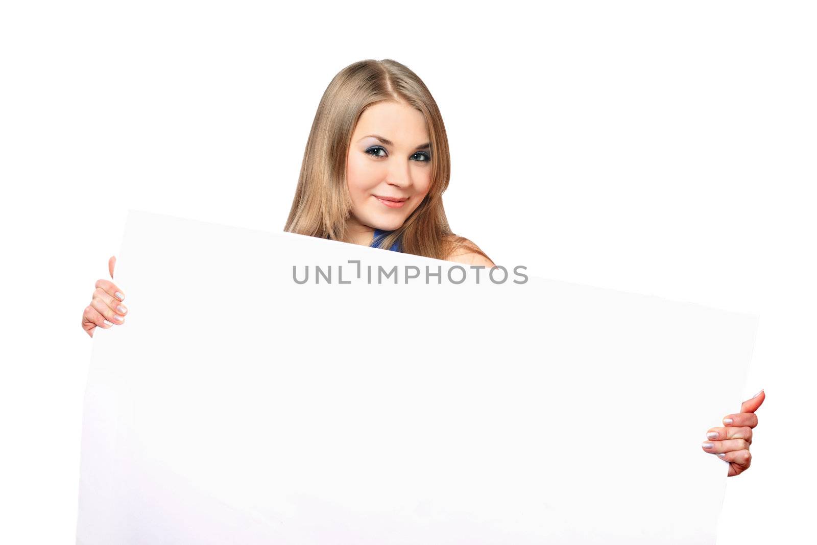 Cheerful young woman posing with white board. Isolated