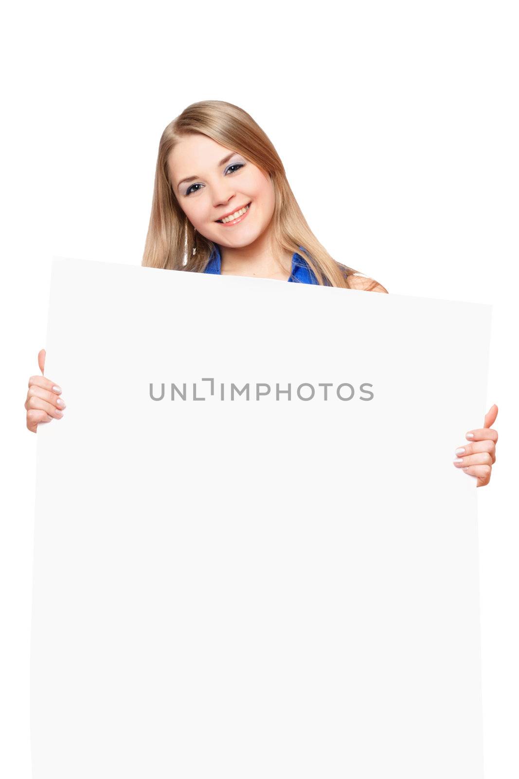 Joyful young woman posing with white board. Isolated