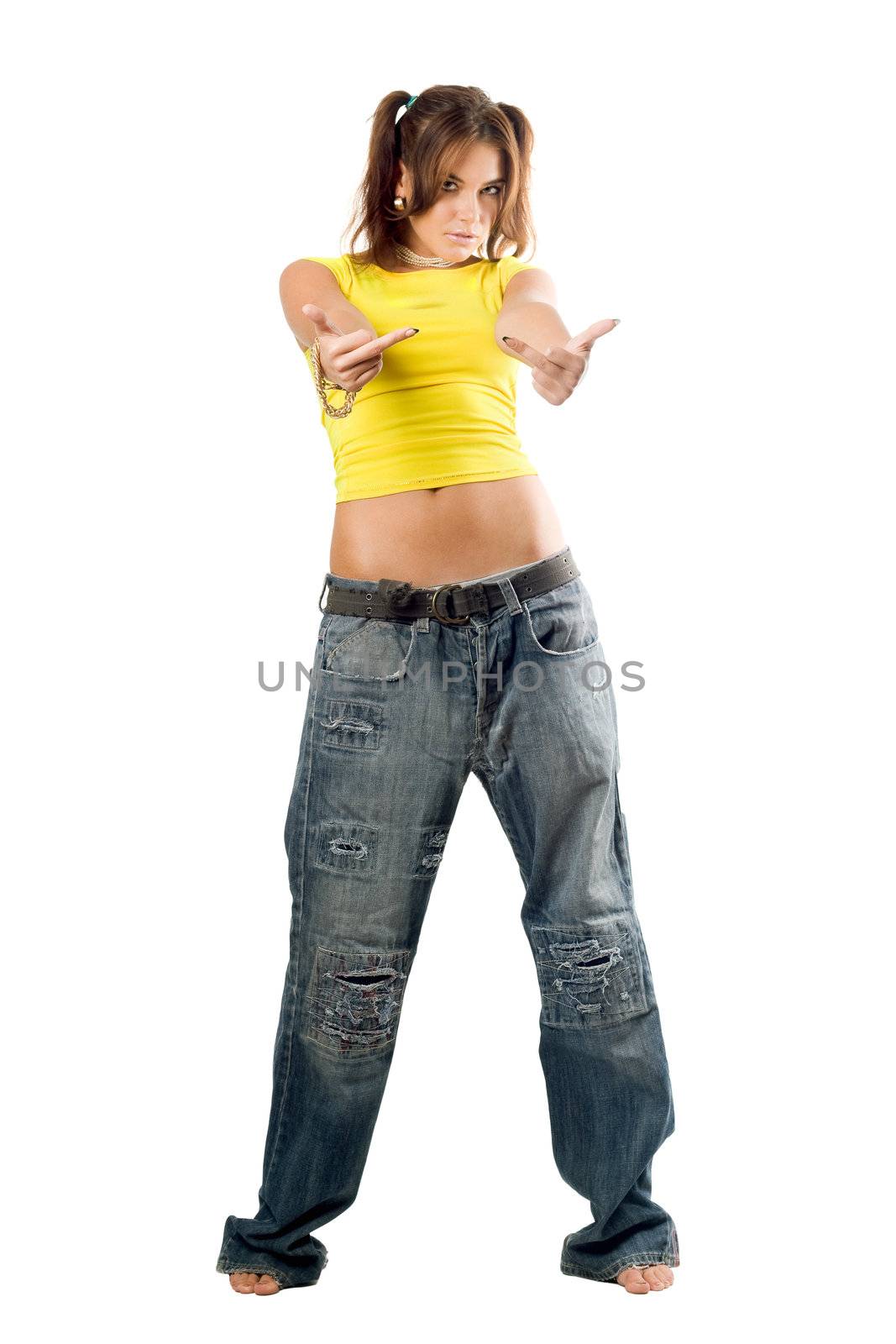 Young woman wearing wide jeans and gesturing. Isolated