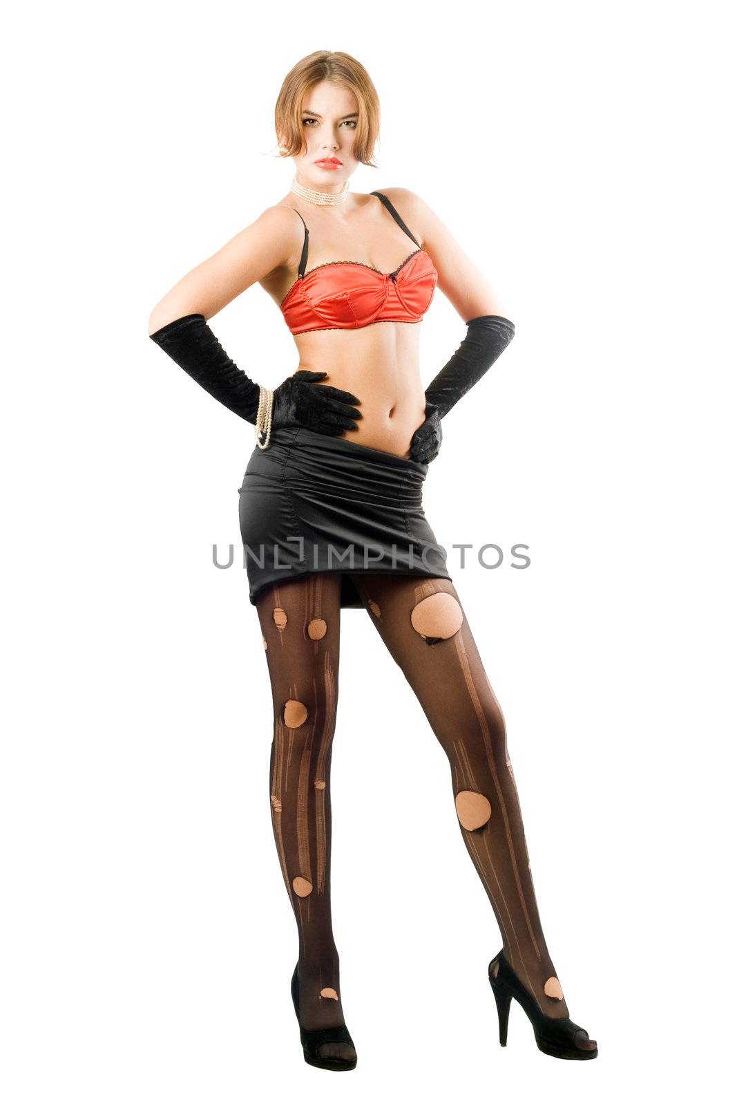 Sexy young woman posing in black holed tights. Isolated