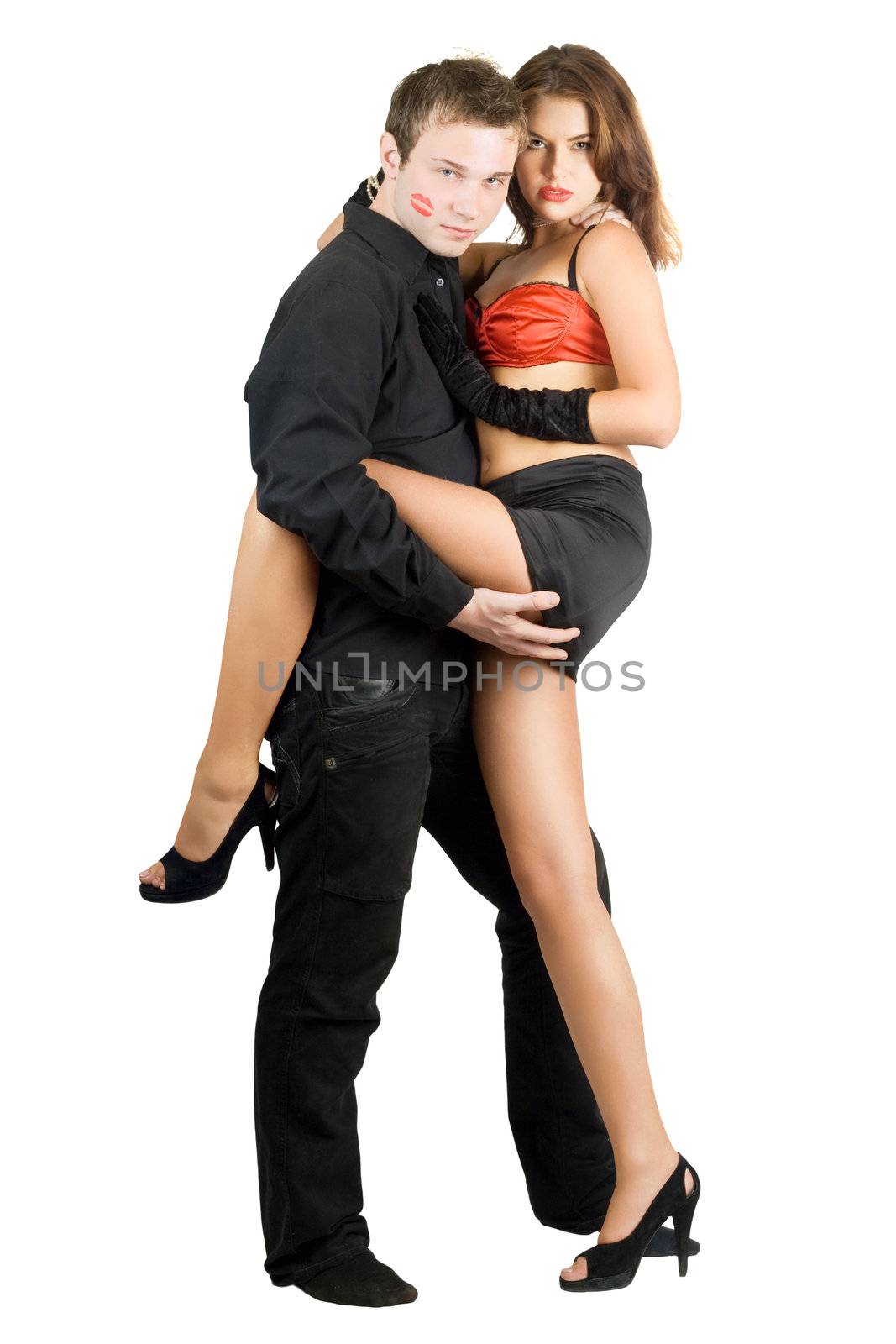 Passionate man holding pretty young woman. Isolated on white