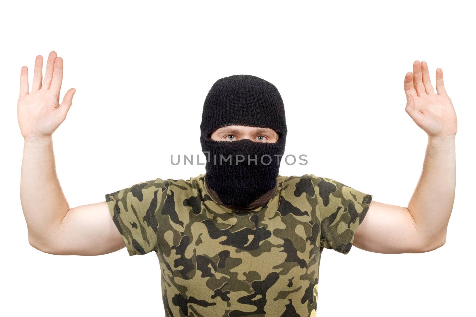 The surrendered criminal in a black mask over white