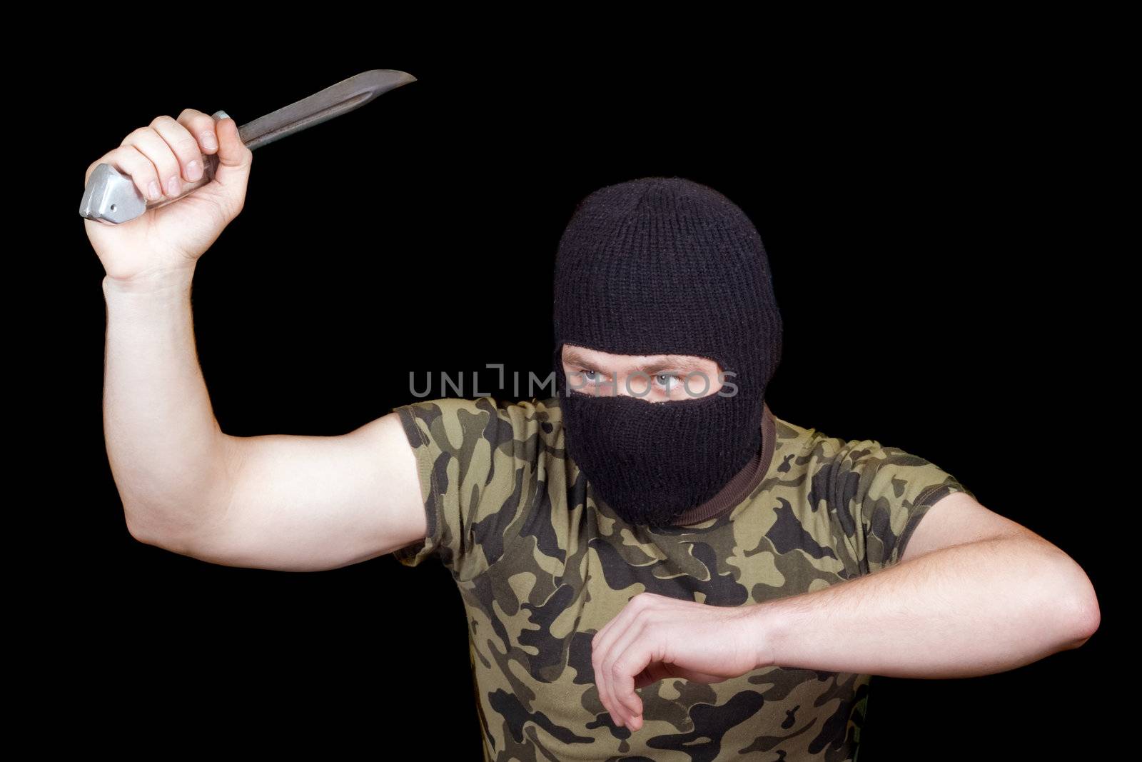 The murderer with a knife in a black mask