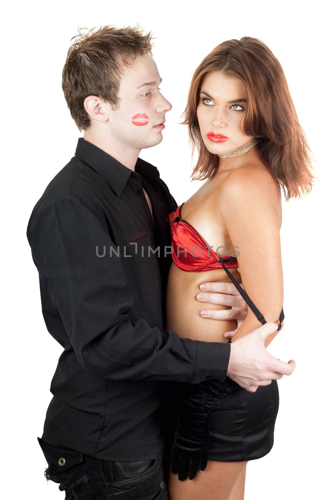 Portrait of the beautiful playful young couple. Isolated