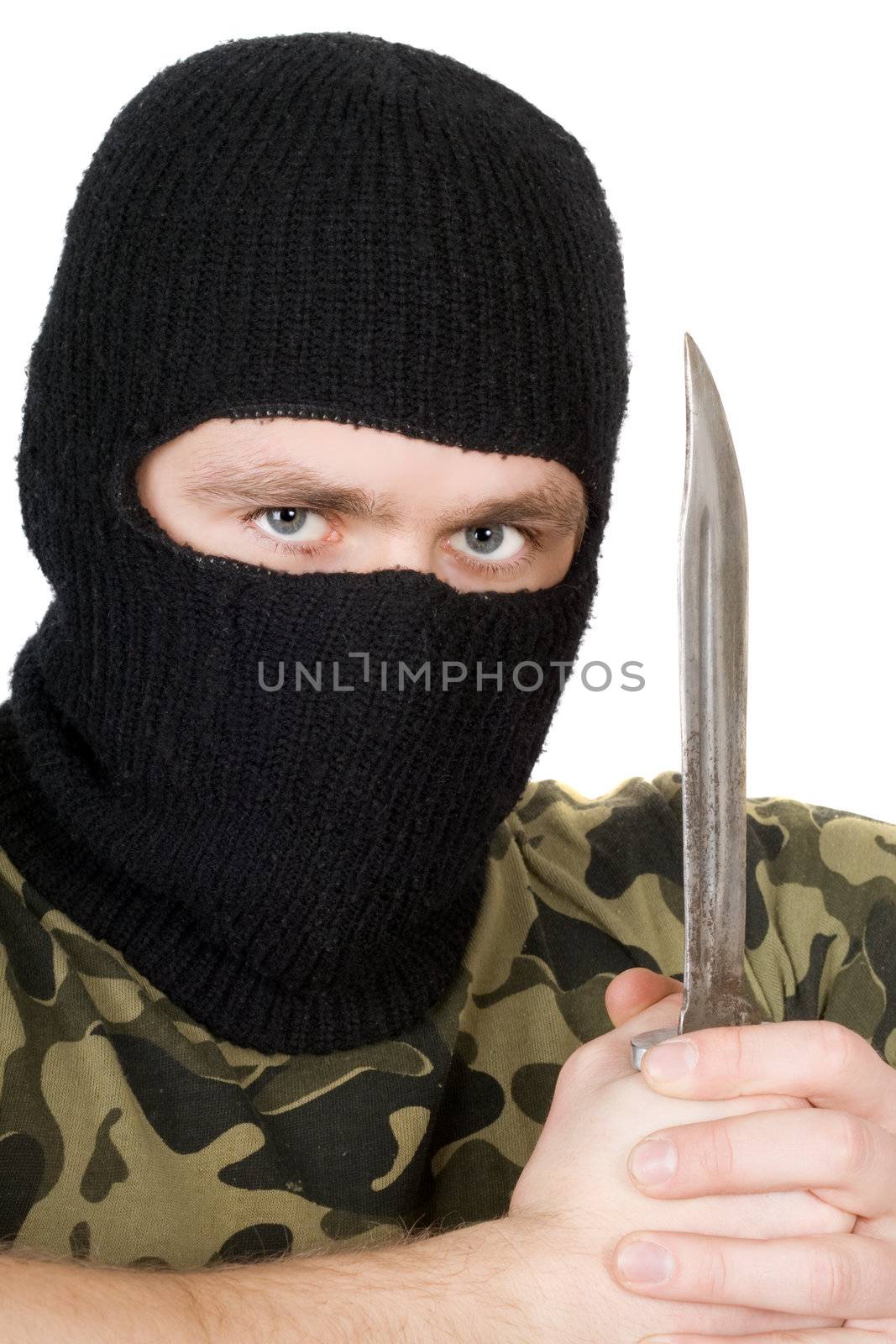 Portrait of the criminal with a knife over white