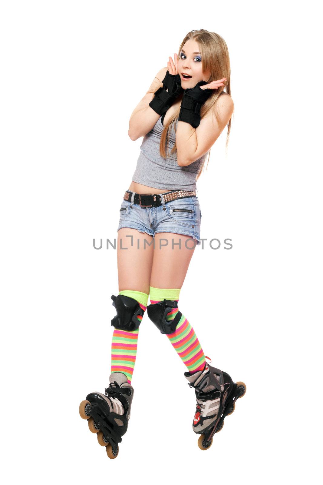 Scared girl tries to keep his balance on roller skates