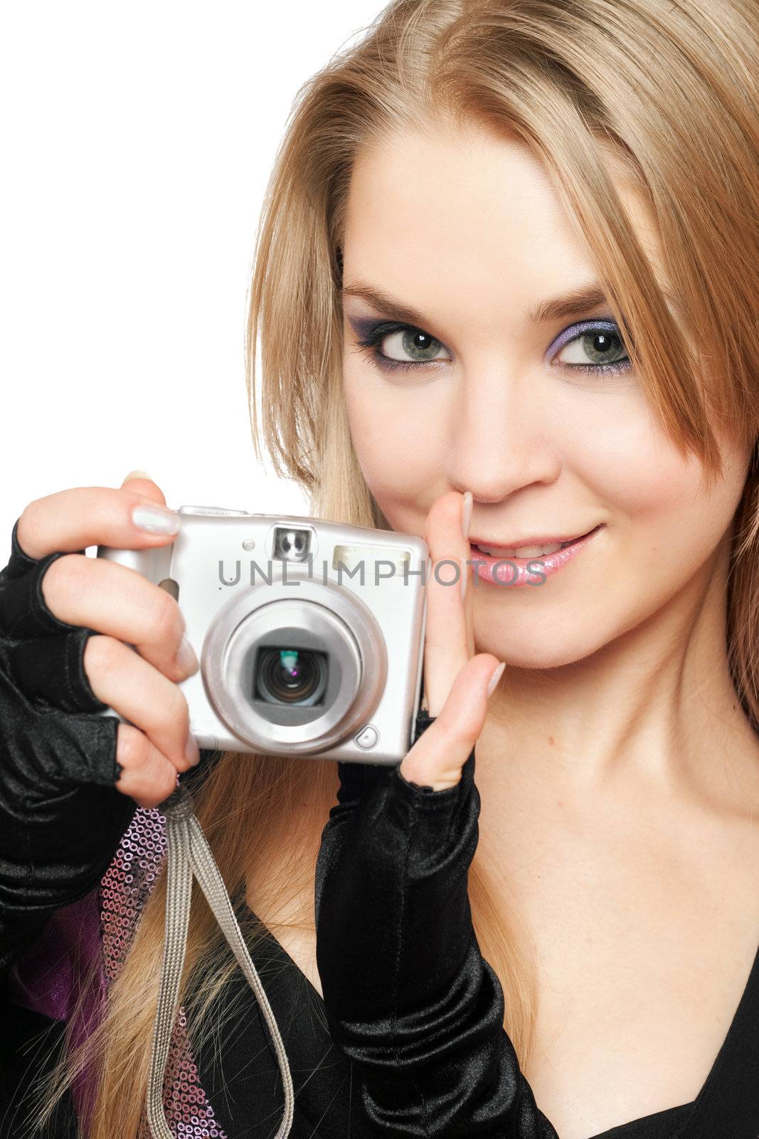 Smiling beautiful blonde holding a photo camera. Isolated