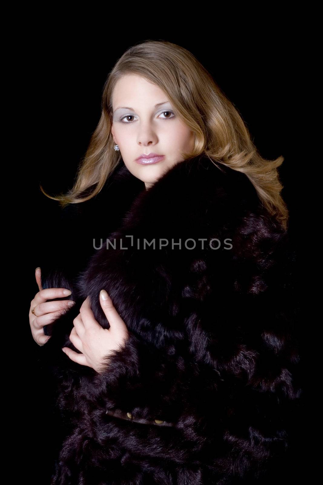The young beautiful woman in a fur coat by acidgrey