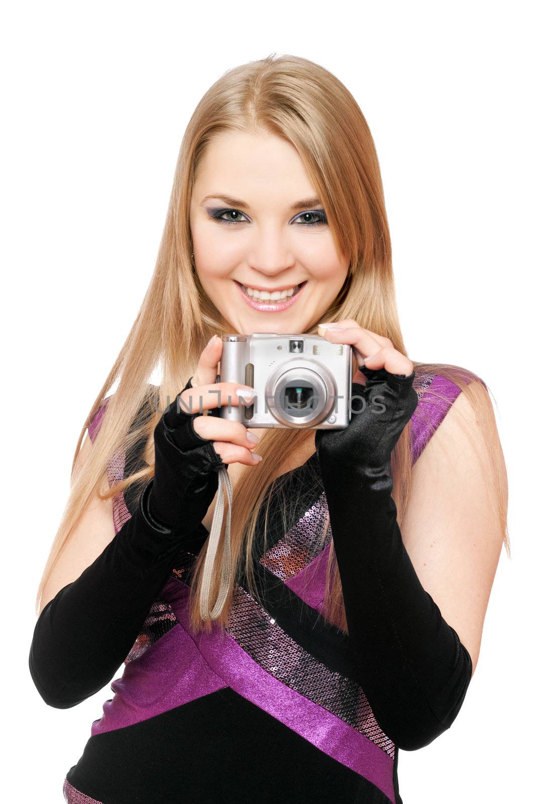 Smiling blonde holding a photo camera. Isolated on white