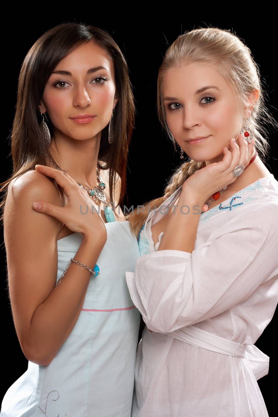 Closeup portrait of a two pretty young women