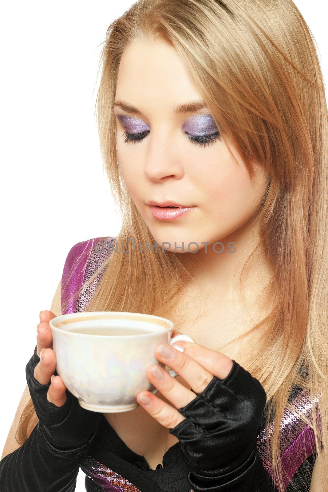 Young beautiful blonde with a cup of hot tea
