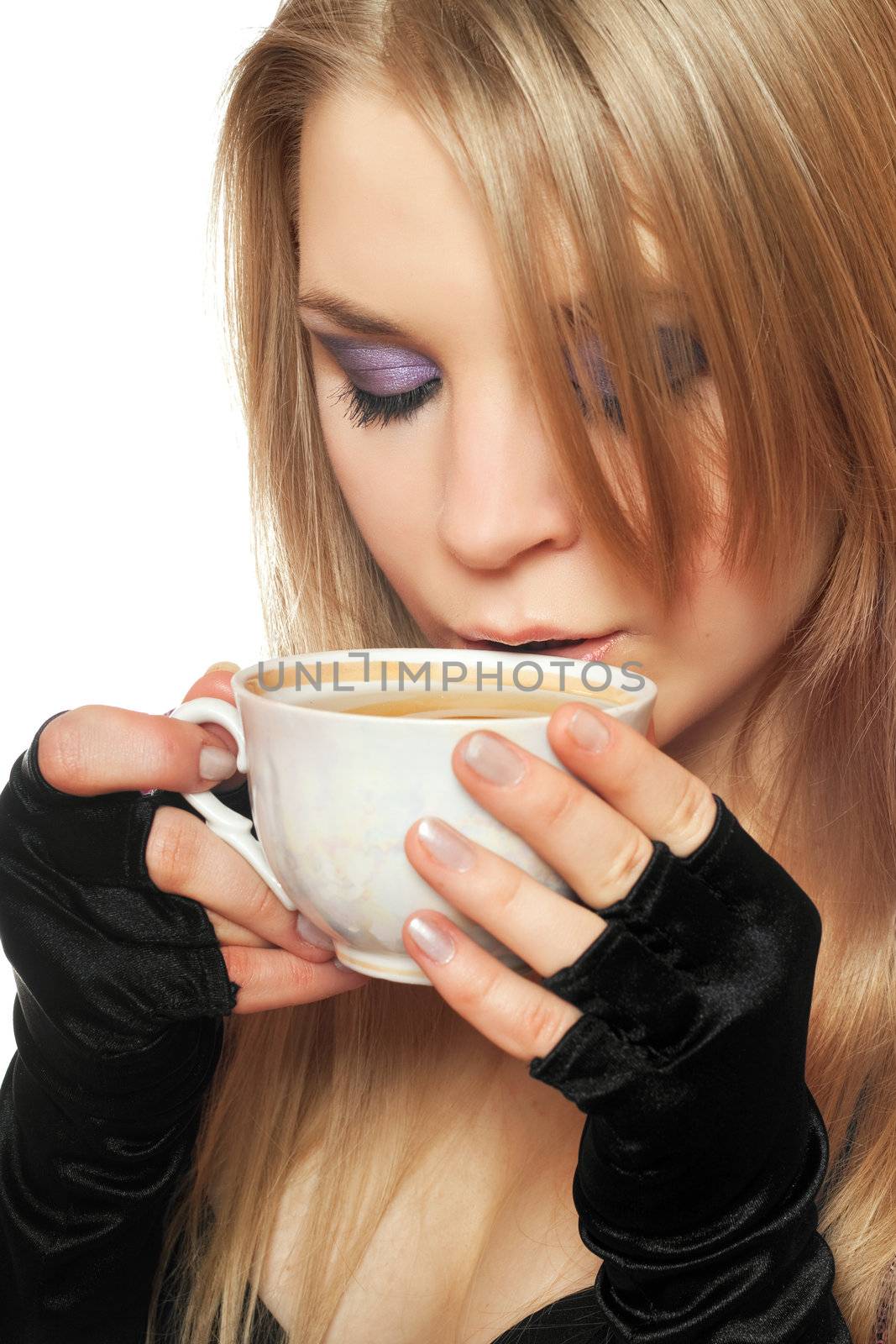 Pretty young blonde with a cup of tea. Isolated by acidgrey