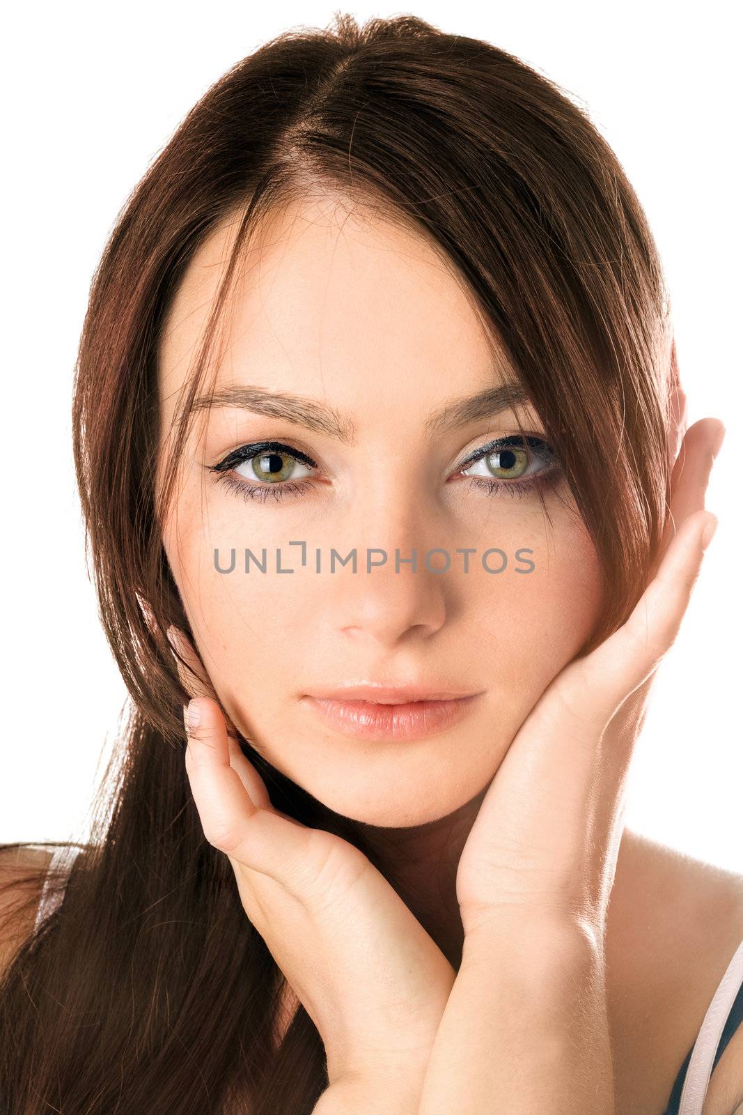 Closeup portrait of a attractive young woman. Isolated