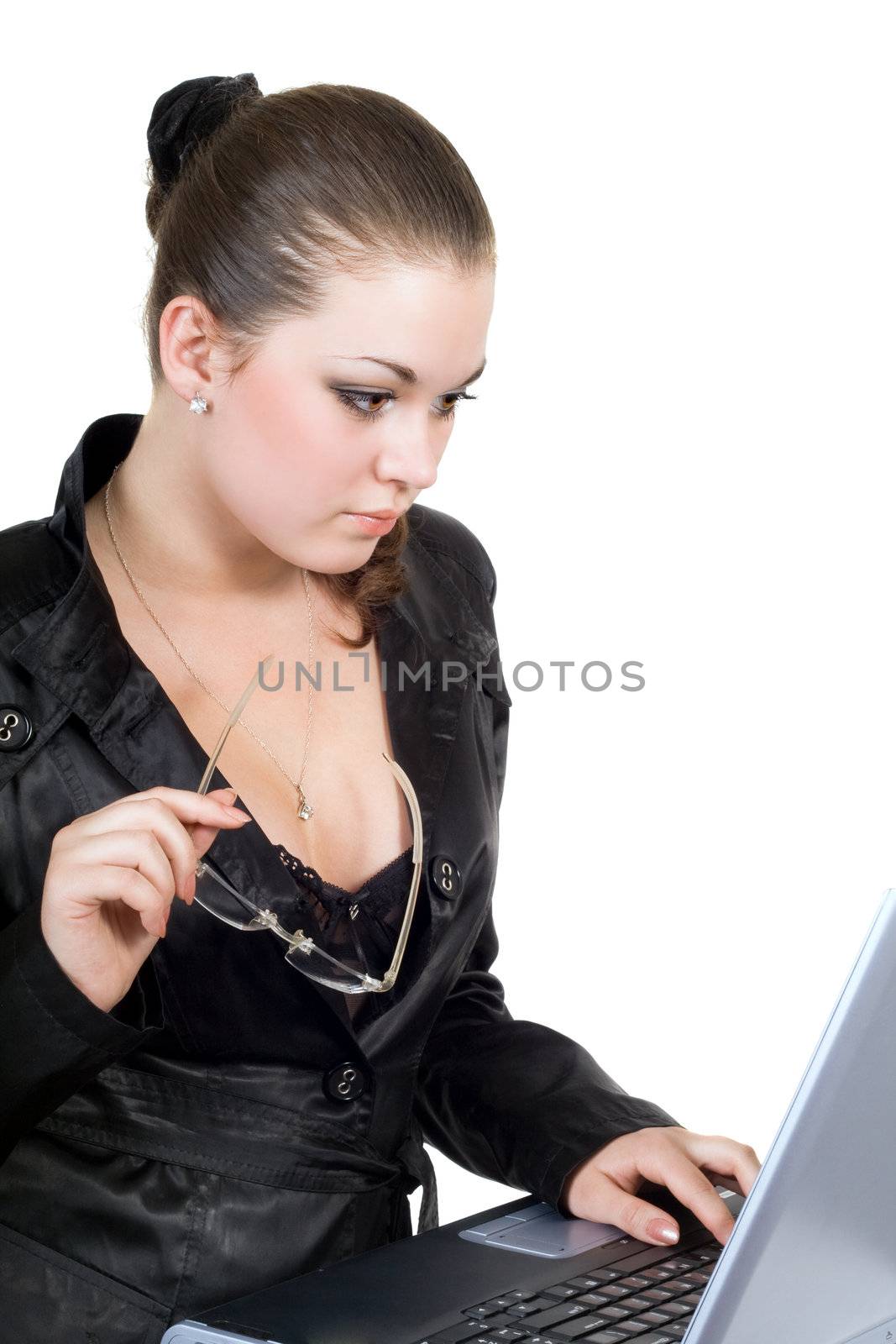 Young businesswoman works on the laptop. Isolated on a white by acidgrey