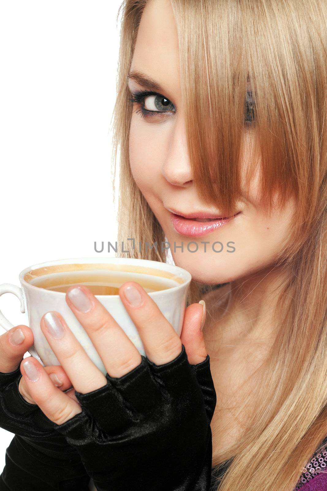 Smiling lovely young blonde with a cup of tea