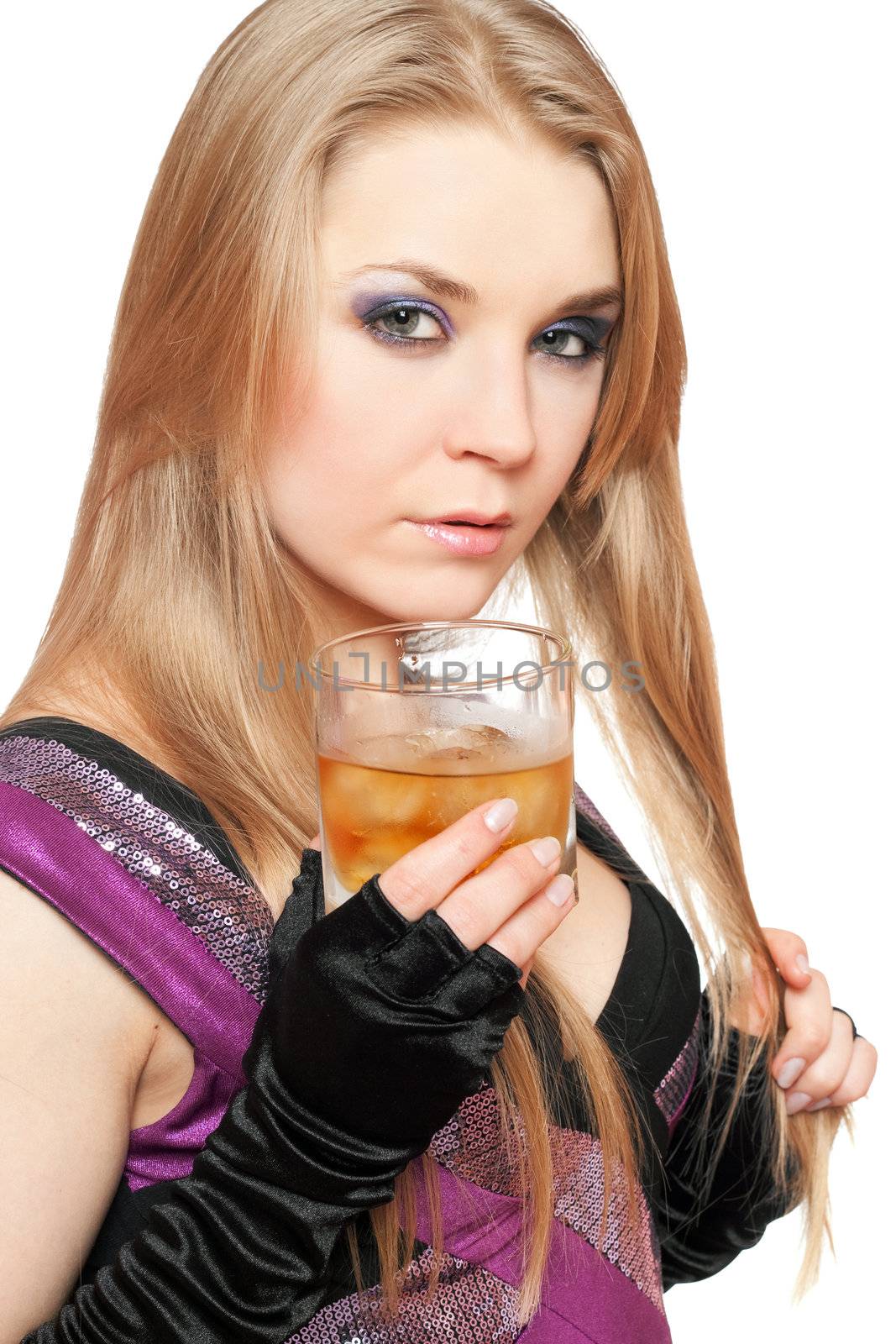 Sexy young blonde with a glass of whiskey. Isolated