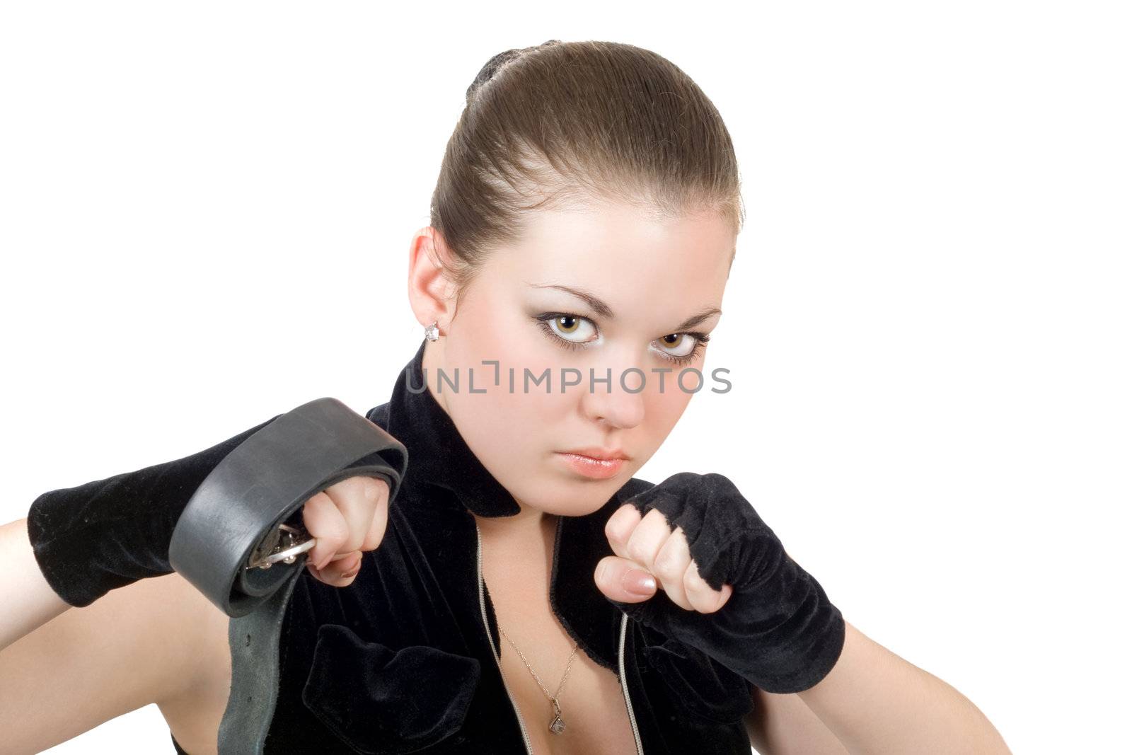 Pretty young angry woman throwing a punch by acidgrey