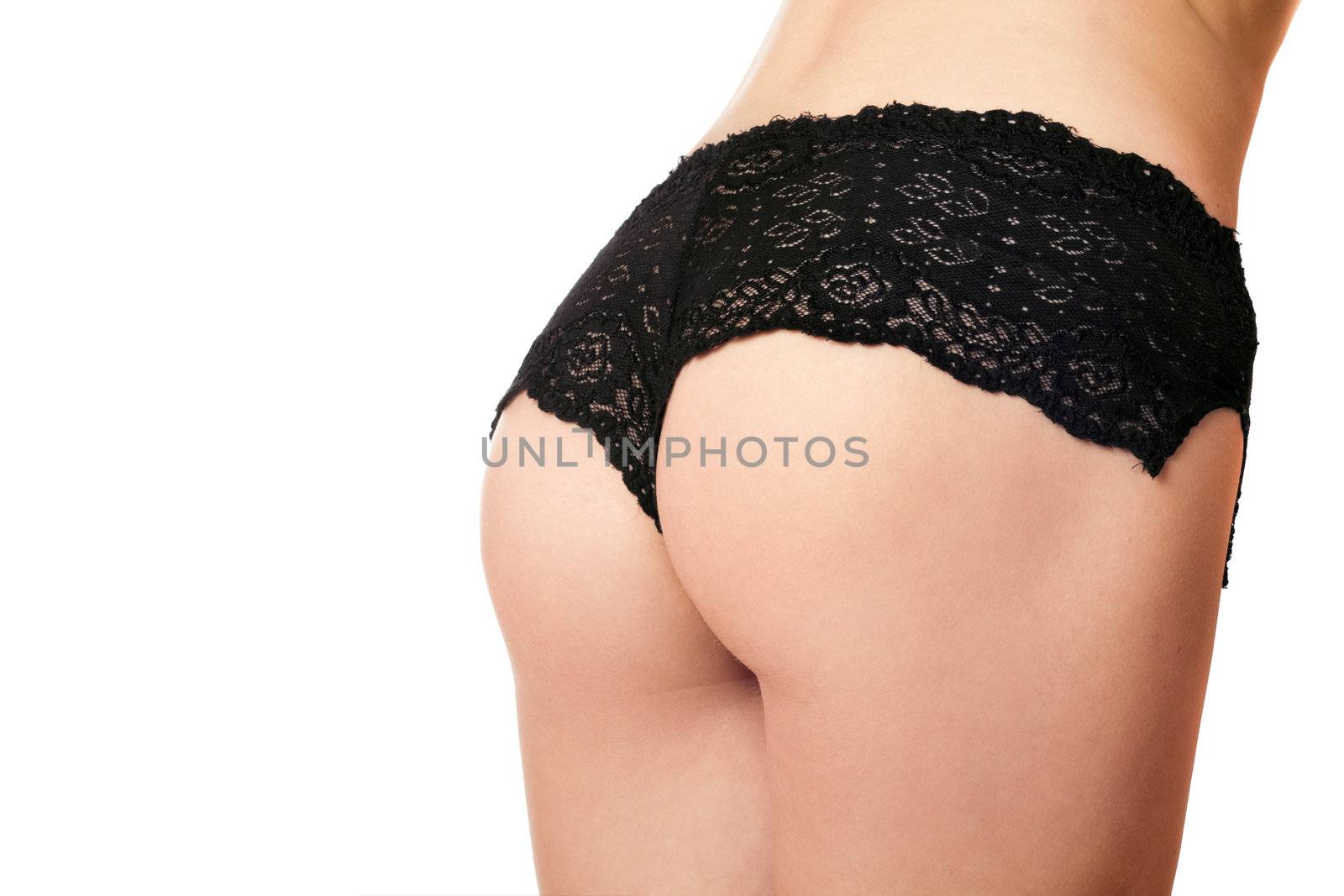 Close-up of perfect female rear in panties. Isolated on white