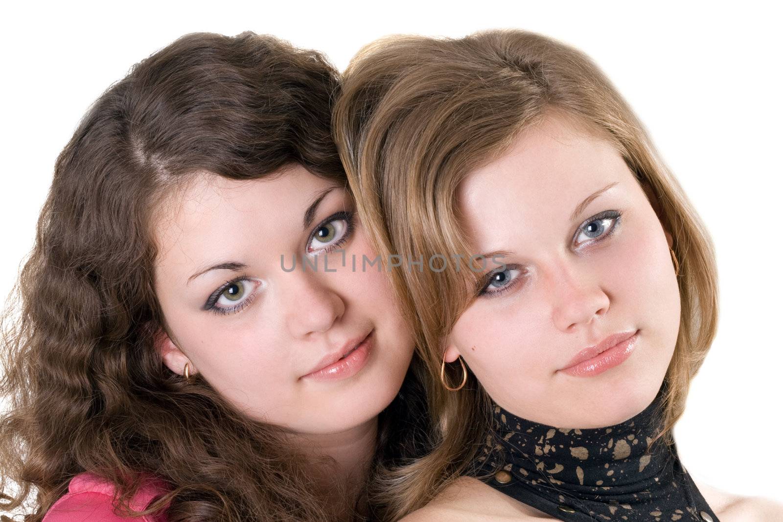 Portrait of the two beauty young women. Isolated. 2