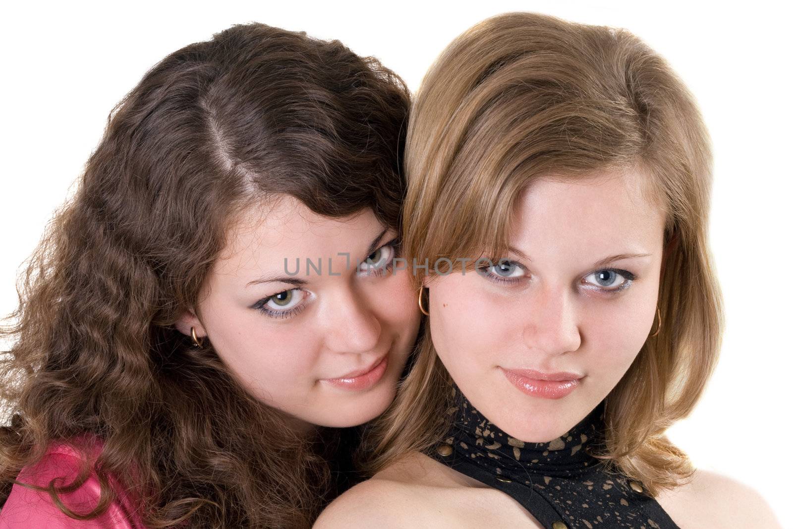 Portrait of the two beauty young women. Isolated.
