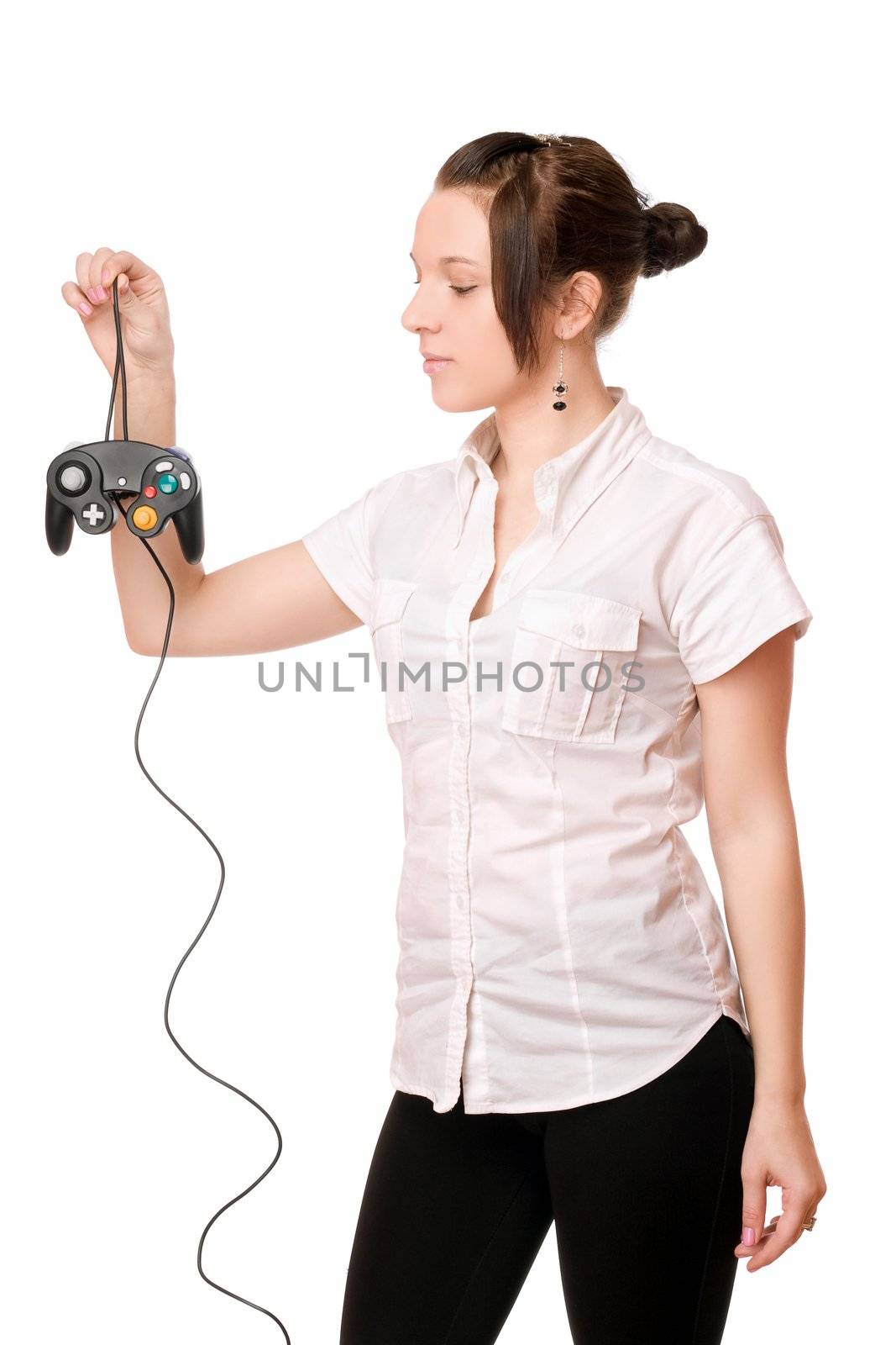 Charming young brunette girl with a joystick