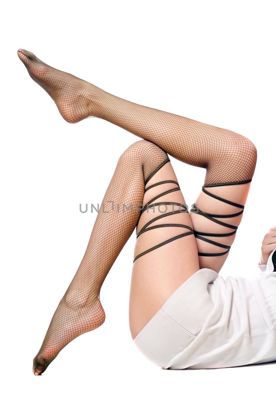 Sexy shapely women's legs in pantyhose. Isolated on white background