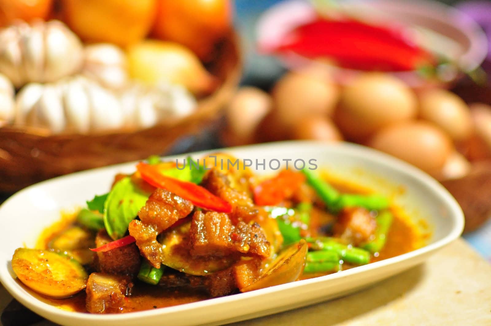 Thai foods spicy curry with crispy pork by TanawatPontchour