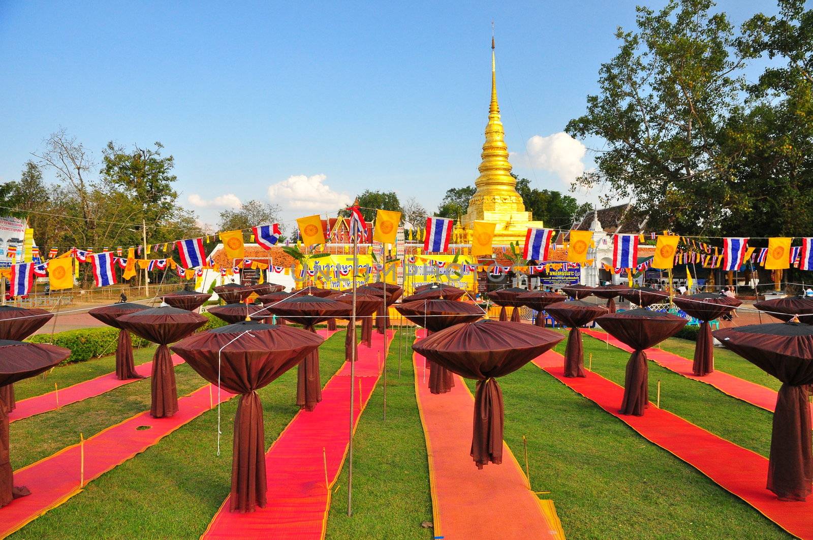 NAN THAILAND - JAN 1 : Meditation Mosquito Net prepared for night meditation with golden stupa background on  January 1, 2010 at  Wat of Muang, Nan, Thailand